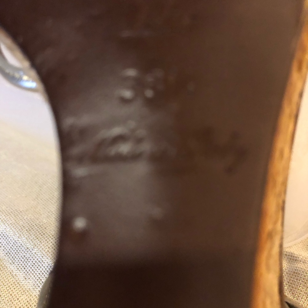 Louis Vuitton brown leather and gold straps, with wooden and straw wedged heel.